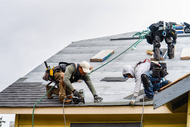 Professional Roofing technician working in La Fargeville, NY